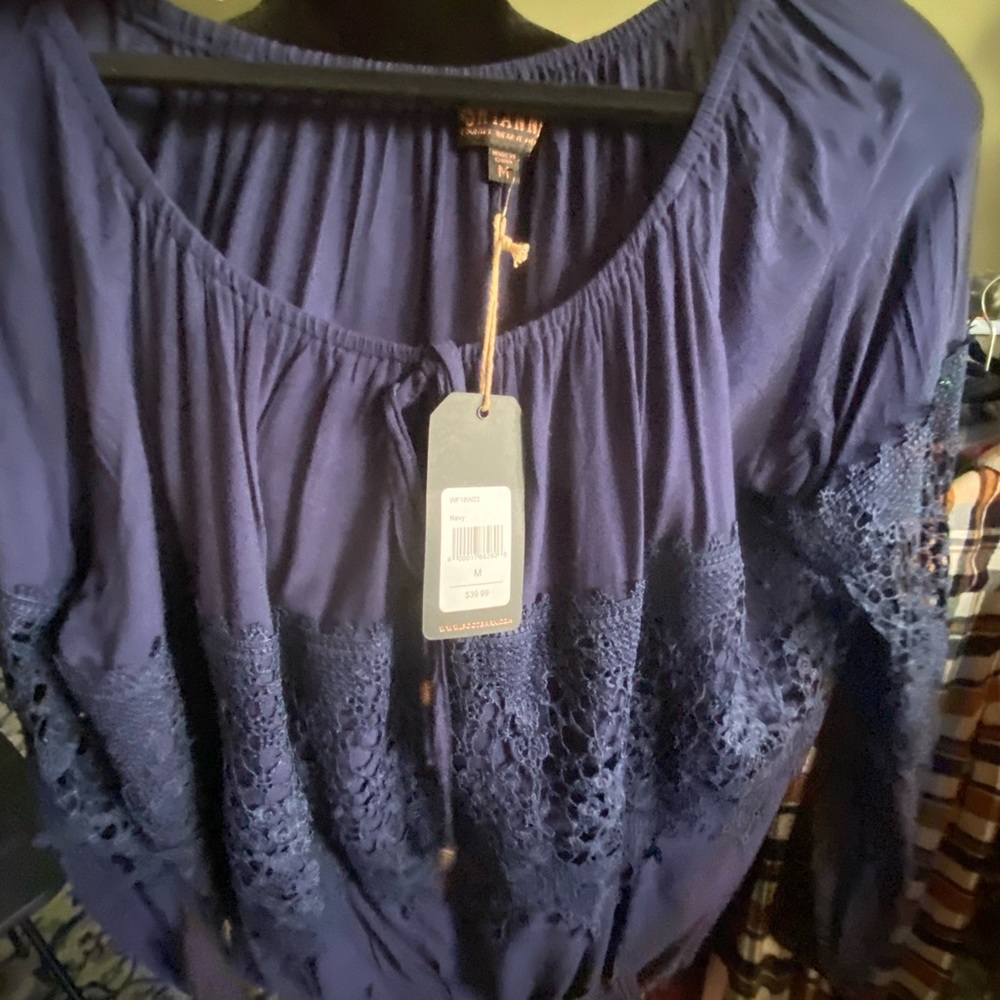 Top with lace on sleeves and shirt size M